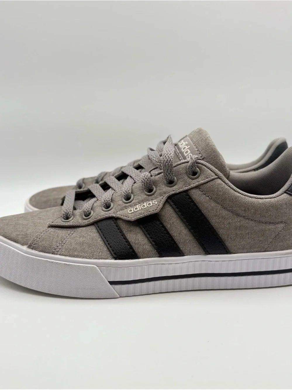 adidas Men’s Gray Canvas Sneakers with Black Stripes